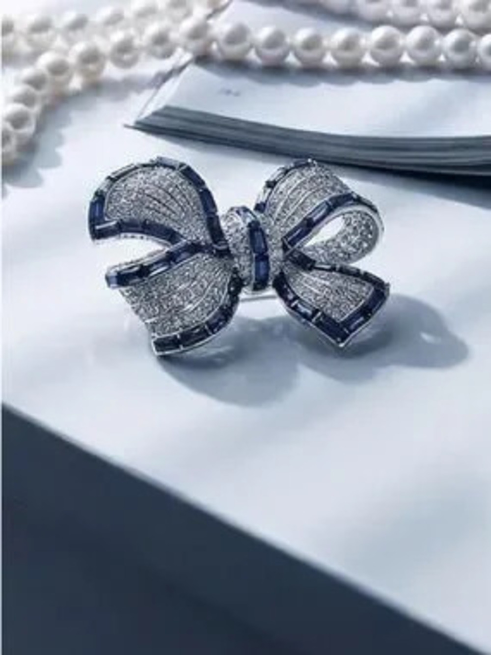 Anthropologie Silver and Blue Bow Brooch